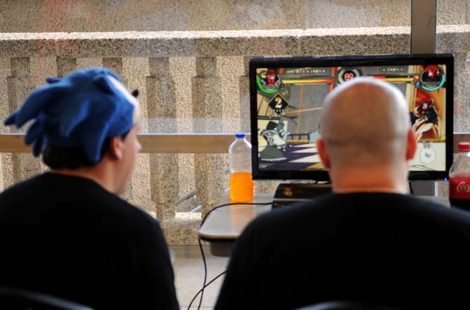 Visitors to Rescon 2013 play video games in the Atchafalaya Room in the Union Monday, April 29, 2013.
 