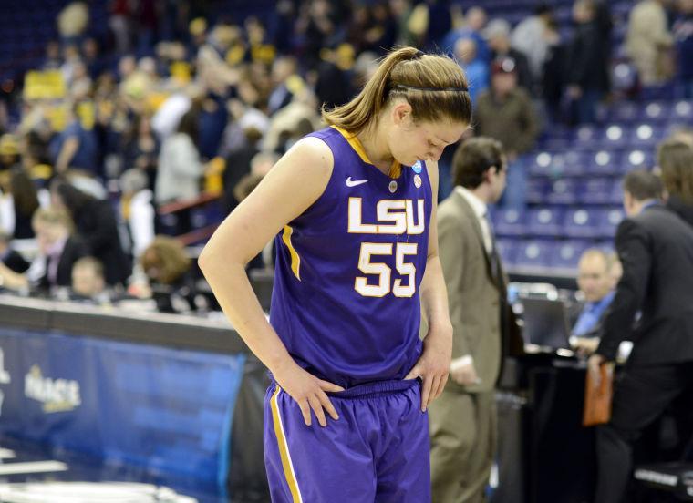 LSU's Theresa Plainsance (55) walks off the court after LSU's loss to California in a regional semifinal game of the NCAA women's college basketball tournament, Saturday March 30, 2013 in Spokane, Wash. California won 73-63. (AP Photo/Jed Conklin)
 