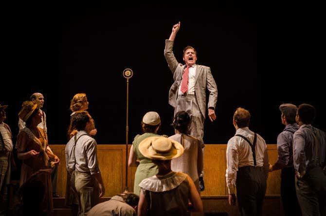 An actor in Swine Palace&#8217;s production of &#8220;All the King&#8217;s Men&#8221; gives a speech to an audience. The play chronicles the rise and fall of an up-and-coming politician.