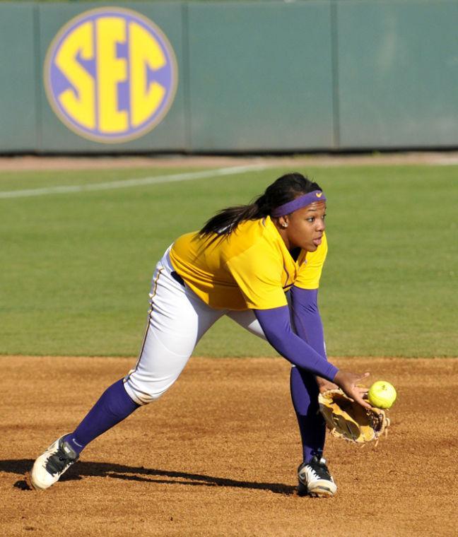 LSU freshman shortstop Bianka Bell (27) tosses Sunday, Feb. 17, 2013 to second for an out during the 1-0 victory over Nicholls State at Tiger Park.