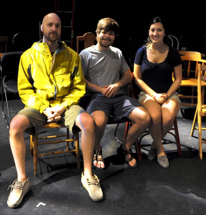 Sound Designer and Theatre senior Devon Lamond (left), Director and Theatre senior Peryn Schmitt (center), and Lighting Designer and Theatre senior Adam Waguepack (right) sit in the audience's seats Monday, April 15, 2013.
 