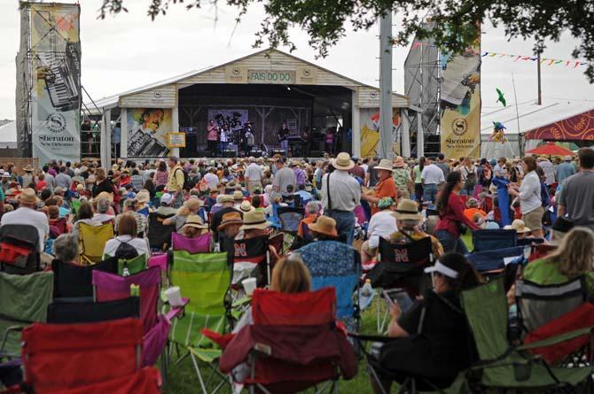 A crowd gathers to watch Terrance Simien and the Zydeco Experience perform Friday, April 26, 2013 at the New Orleans Jazz &amp; Heritage Festival on the Fair Grounds Race Course.
 