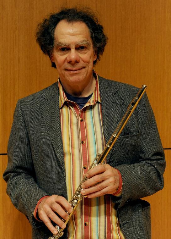 Robert Dick poses with his flute in the School of Music Tuesday, April 23, 2013. He will be performing as a guest during a recital April 24 from 7:30-10:00 PM.
 