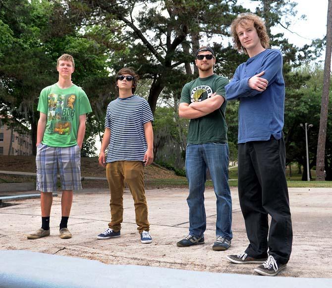 (Left to right.) Civil Engineering junior Dom Dejuilio, Mass Communications junior Andrew Vorniak, Interdisciplinary Studies junior John Trufant, and Music junior Scott Graves are part of the Levee Daze Band, which will be playing during Grooving on the Grounds on LSU's campus.
 