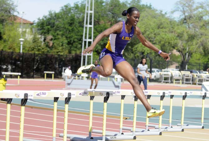 LSU junior Nikita Tracey leaps during the women's 400 meter hurdles Saturday, April 13, 2013.
 