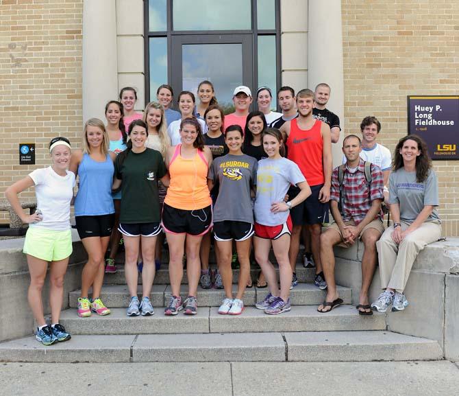 Dr. Stewart's KIN 4526, section 1 class stands in front of the Huey P. Long Fieldhouse Tuesday, April 23, 2013. The class will be running the Kentucky Derby Marathon in support of the Boston Marathon bombing victims.
 