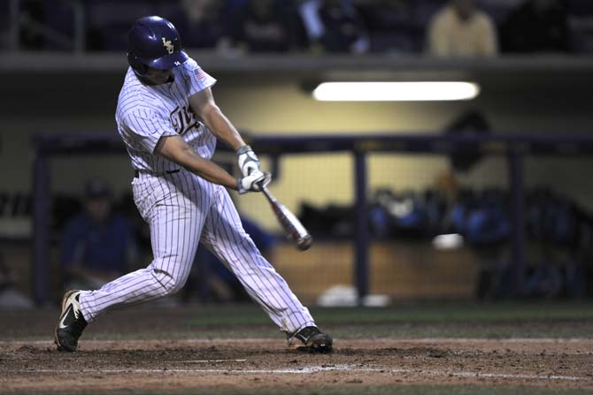 LSU junior infielder Christian Ibarra hits the ball Tuesday, April 30, 2013, during the Tigers' 7-3 win against the MSU Cowboys.
 