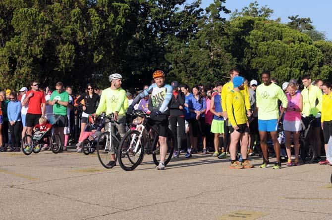 A crowd prepares to take off Saturday, April 20, 2013, at the steps of the Louisiana State Capitol for Baton Rouge Run for Boston, a 2.62 mile run organized by several local running clubs to support victims of the Boston Marathon bombing.
 