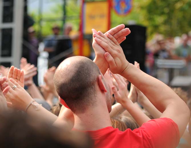 The crowd applauds Royal Teeth April 27, 2013, at Festival International de Louisiane in Lafayette, La.
 