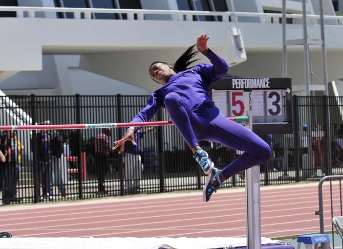 LSU junior Lynnika Pitts jumps over a bar April 20, 2013 during the LSU Alumni Gold meet in the Bernie Moore Track Stadium.
 