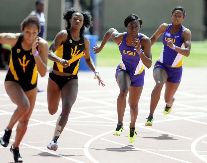 Arizona state and LSU students sprint during the women's 4x100 meter relay Saturday, April 13, 2013.
 