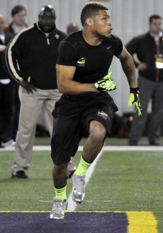 Former LSU sophomore corner back Tyrann Mathieu (7) runs a route Wednesday, March 27, 2013 during Pro Day at Football Operations Center.