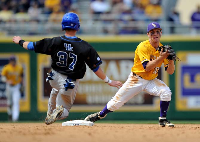 LSU freshman infielder Alex Bregman (30) catches the ball to strike out a Kentucky player at second base Sunday, April 7, 2013 during the Tigers' 11-4 victory against the Wildcats in Alex Box Stadium.
 