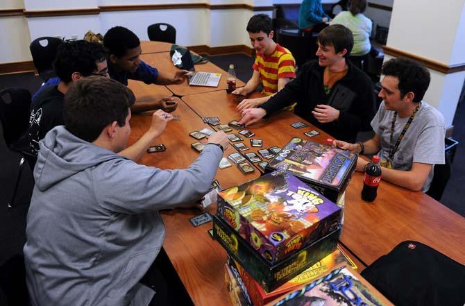 Members of the strategic game club play a card game April 12, 2013 in East Laville Hall.
 