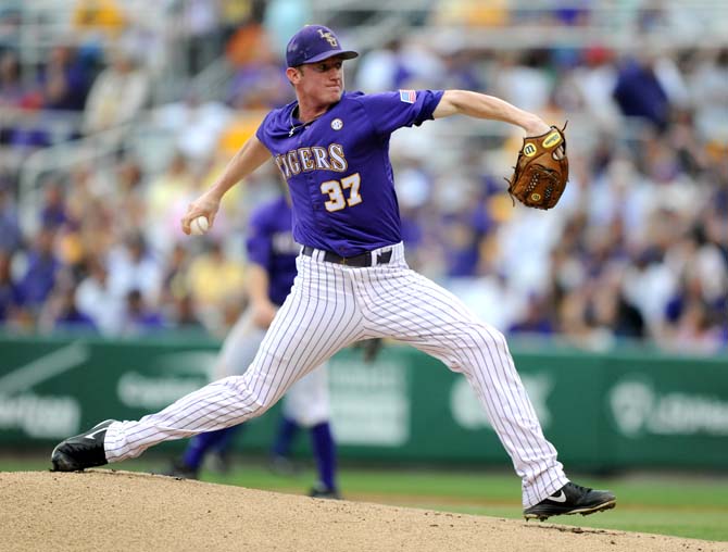 LSU junior pitcher Ryan Eades (37) lunges forward into his pitch Saturday, April 27, 2013 during the Tigers' 4-2 loss to South Carolina in Alex Box Stadium.
 