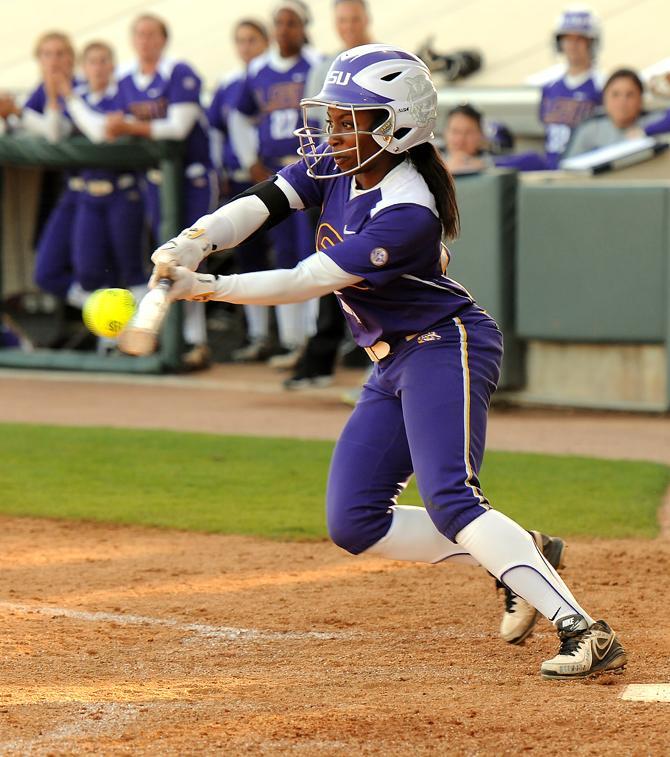 LSU junior right fielder Simone Heyward (25) swings at a pitch Saturday, March 16, 2013 during the 4-3 extra innings victory against Kentucky at Tiger Park.