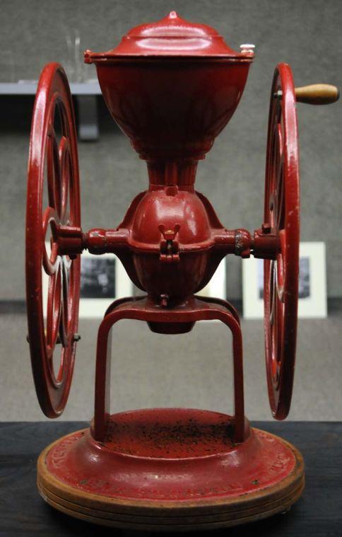 A coffee grinder from New Orleans, circa 1880 stands on display in the LSU Union Art Gallery as part of the showing called A Slice of South Louisiana.
 