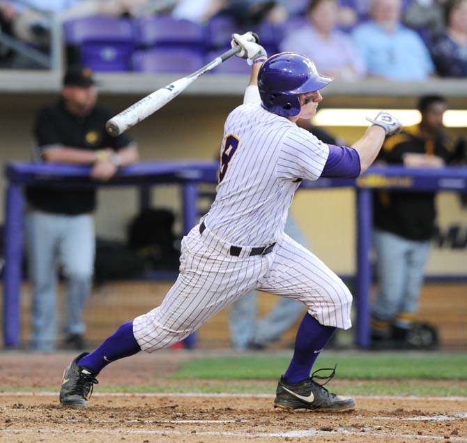 LSU senior infielder Mason Katz (8) swings at the ball April 17, 2013, during the Tigers' 4-0 victory against Grambling at Alex Box Stadium.
 