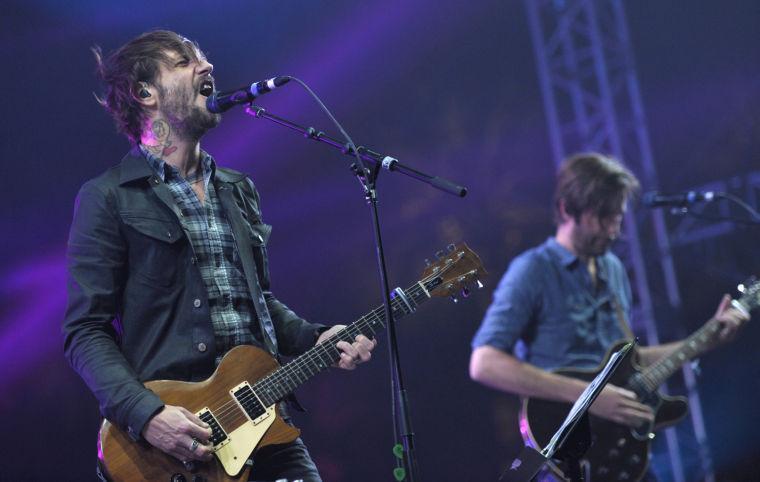 Ben Bridwell, left, of Band of Horses performs at the second weekend of the 2013 Coachella Valley Music and Arts Festival at the Empire Polo Club on Friday, April 19, 2013 in Indio, Calif. (Photo by John Shearer/Invision/AP)
 