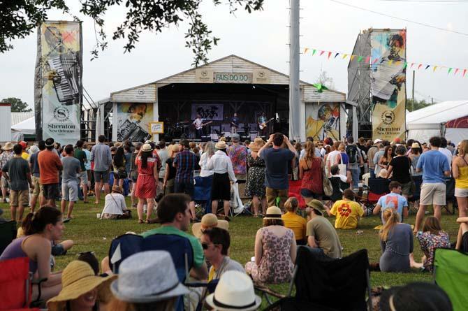 A crowd gathers to watch Andrew Bird perform Saturday, April 27, 2013 at the New Orleans Jazz &amp; Heritage Festival on the Fair Grounds Race Course.
 