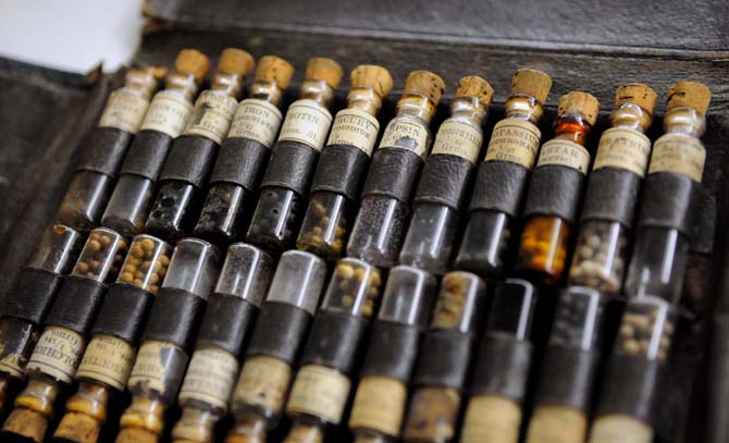 Some medicinal capsules that still have medicine in them sit on display in the LSU Union Art Gallery as a part of the showing titled A Slice of South Louisiana.
 