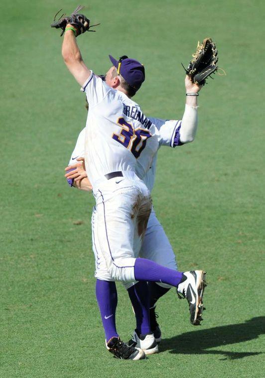 LSU senior outfielder Raph Rhymes (4) and freshman infielder Alex Bregman (30) collide May 31, 2013 during the Tigers' 11-7 win against Jackson State in Alex Box Stadium. Rhymes suffered a cut lip while Bregman was sent to the hospital for examination.
 