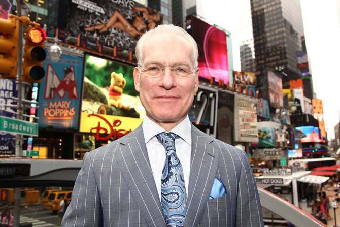 FILE - This July 19, 2012 file photo shows host Tim Gunn poses for a photo while promoting the launch of the new season of "Project Runway" in New York's Times Square. In the new Disney Junior animated series &#8220;Sofia the First,&#8221; Gunn voices royal steward character Baileywick who helps a princess adapt to royal life after her mother marries a king. (Photo by Donald Traill/Invision/AP, file)
 