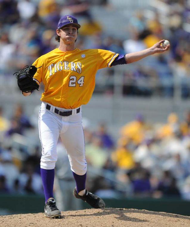 LSU sophomore left-handed pitcher Cody Glenn (24) throws the ball to first base Sunday, March 10, 2013 during the Tigers' 7-5 victory against the Washington Huskies in Alex Box Stadium.