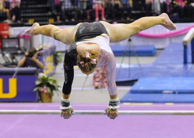 LSU junior all-around Kaleigh Dickson recovers from a fall and finishes her uneven bars routine March 8, 2013, during the Tigers' 197.500-197.725 loss against Alabama at the PMAC.