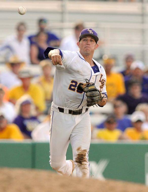 LSU senior infielder Casey Yocom (28) throws the ball toward first base May 31, 2013 during the Tigers' 11-7 win against Jackson State in Alex Box Stadium.
 