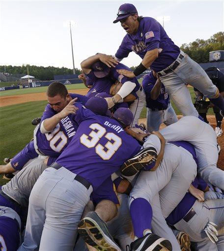 LSU players react after defeating Vanderbilt in the Southeastern Conference NCAA college baseball tournament championship game at the Hoover Met in Hoover, Ala., Sunday, May 26, 2013. LSU defeated Vanderbilt 5-4 in 11 innings. (AP Photo/Dave Martin)
 