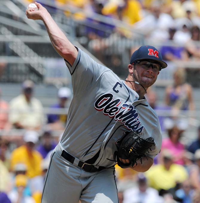 Ole Miss junior pitcher Bobby Wahl (19) throws to first May 18, 2013 during the Tigers' 9-11 loss to the Rebels in Alex Box Stadium.
 