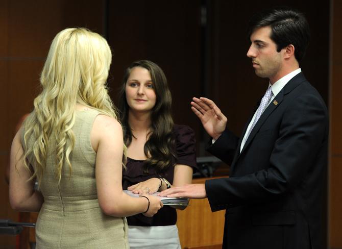 LSU student governent president John Woodard (right) and vice president Taylor Parks (left) were sworn in Wednesday, April 17, 2013 in the Capital Chamber's room in the Student Union.