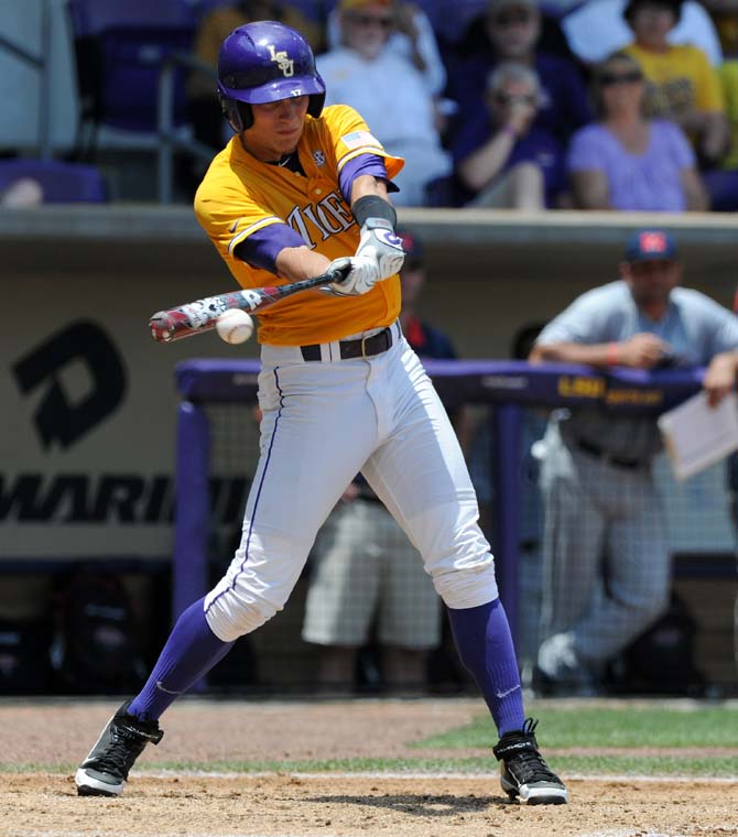 LSU sophomore infielder Jared Foster (17) hits the ball May 18, 2013 during the Tigers' 9-11 loss to Ole Miss in Alex Box Stadium.
 