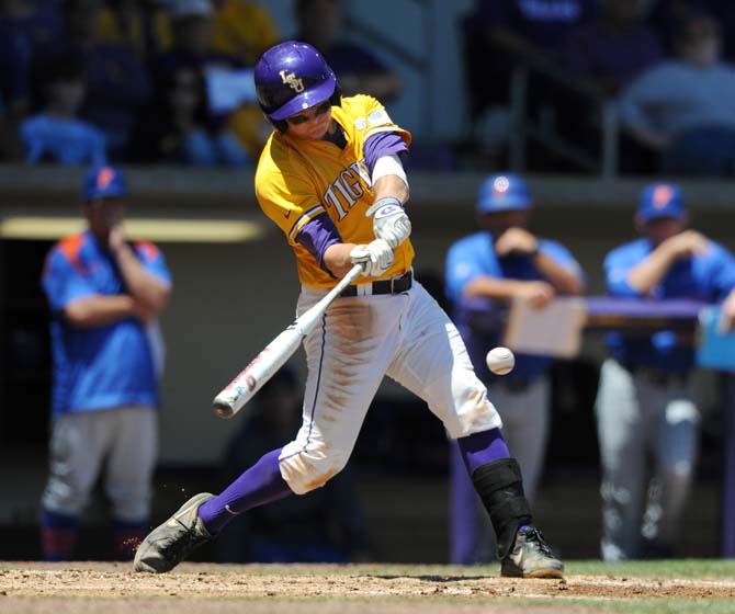 LSU senior infielder Mason Katz (8) swings at a ball May 4, 2013 during the Tigers' 18-6 win against the Florida Gators in Alex Box Stadium.
 