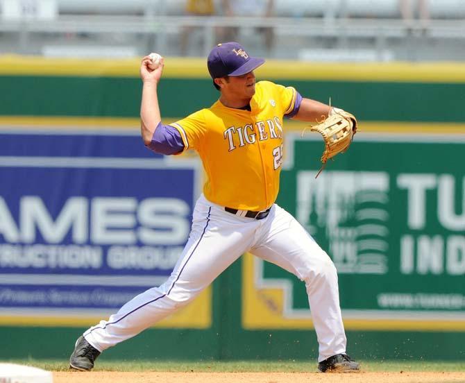 LSU junior pitcher Nate Fury (29) throws toward first base May 18, 2013 during the Tigers' 9-11 loss to Ole Miss in Alex Box Stadium. Fury played second base during the game while the starter, Mason Katz, rested in the dugout.
 