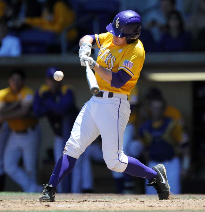 LSU junior outfielder Sean McMullen hits the ball May 4, 2013 during the Tigers' 18-6 win against Florida in Alex Box Stadium.
 