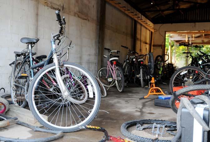 Bikes sit in a warehouse April 30, 2013 at Front Yard Bikes.
 