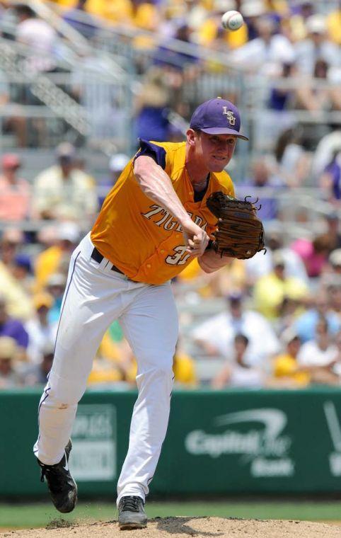 LSU junior pitcher Ryan Eades (37) throws toward first base May 18, 2013 during the Tigers' 9-11 loss to Ole Miss in Alex Box Stadium.
 