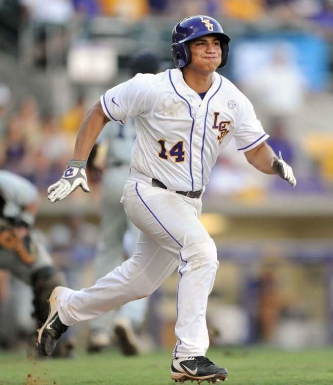 LSU junior infielder Christian Ibarra (14) sprints down the first base line May 31, 2013 during the Tigers' 11-7 win against Jackson State in Alex Box Stadium.
 