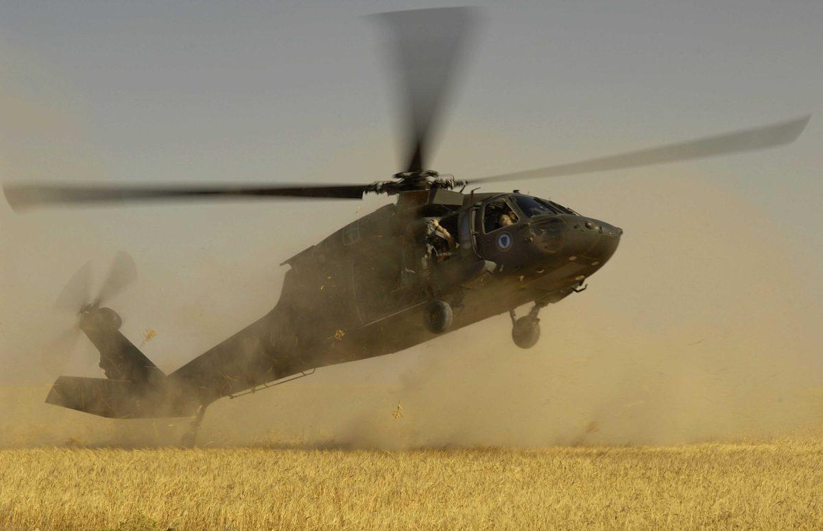 A Black Hawk helicopter touches down in Iraq. Two similar helicopters will land on campus today as part of a Bengal Raiders qualification course.