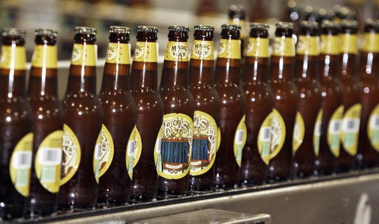 In this Dec. 6, 2007 file photo, bottles move down the production line at Magic Hat Brewery in South Burlington, Vt.
 