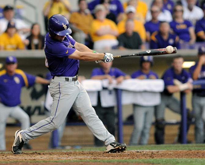 LSU freshman infielder Alex Bregman (30) hits the ball June 8, 2013 during the Tigers' 11-1 victory over Oklahoma in Alex Box Stadium.
 