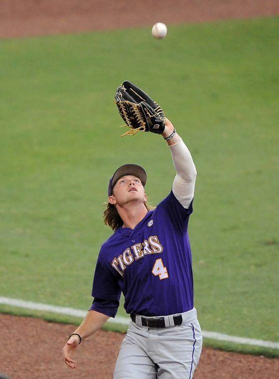 LSU senior outfielder Raph Rhymes (4) catches a fly ball June 8, 2013 during the Tigers' 11-1 win against Oklahoma in Alex Box Stadium.
 