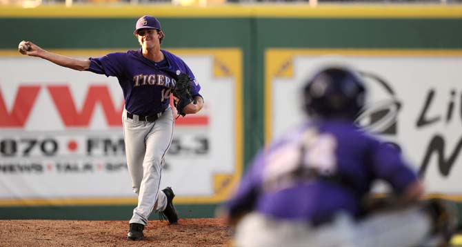 LSU sophomore pitcher Aaron Nola (10) warms up June 1, 2013 before the Tigers' game against Sam Houston in Alex Box Stadium. The Tigers would eventually win, 8-5.
 