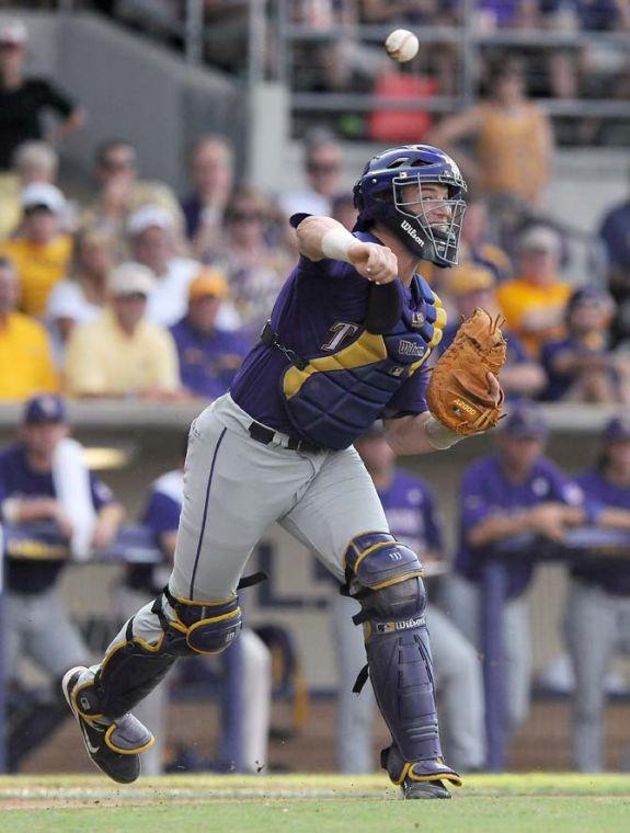 LSU junior catcher Ty Ross (26) throws the ball to first base June 8, 2013 during the Tigers' 11-1 Super Regional win against Oklahoma in Alex Box Stadium.
 