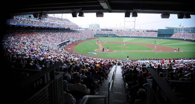 Fans from all over the country gather inside of TD Ameritrade Park June 15, 2013 during the first game of the College World Series between Mississippi State and Oregon State in Omaha, Nebraska.
 