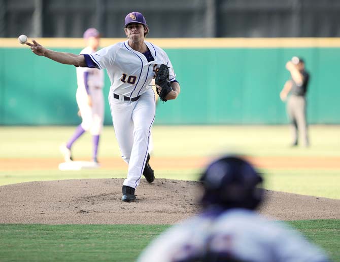 LSU sophomore pitcher Aaron Nola (10) warms up June 7, 2013 before the Tigers' Super Regional matchup with the Oklahoma Sooners. Nola would pitch all nine innings in the 2-0 shutout in Alex Box Stadium.
 