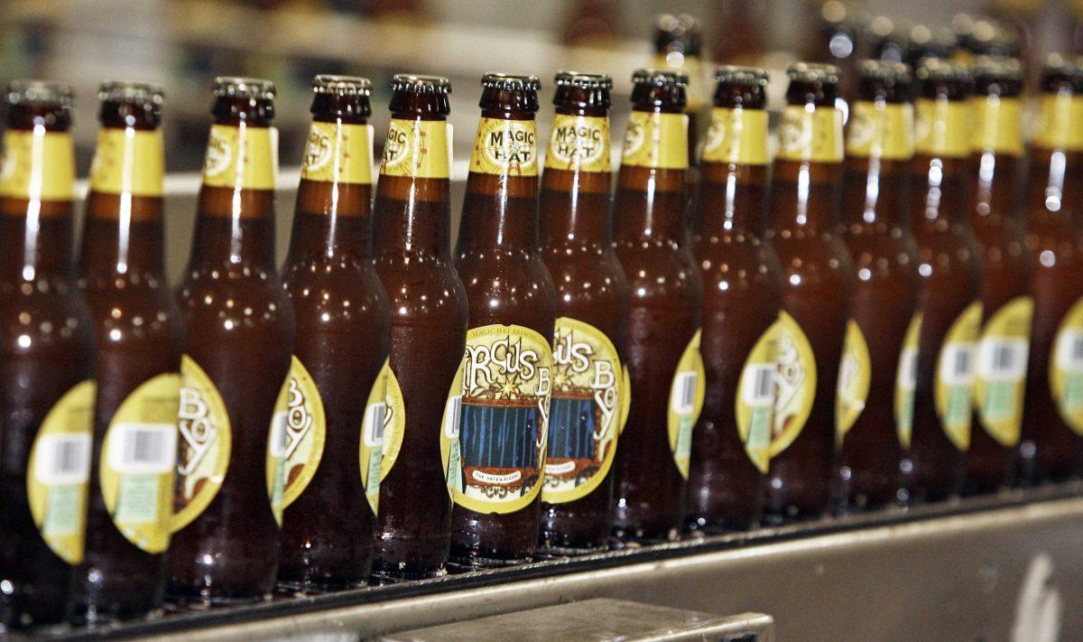 In this Dec. 6, 2007 file photo, bottles move down the production line at Magic Hat Brewery in South Burlington, Vt.