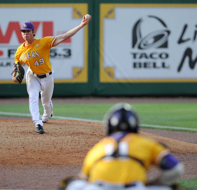 LSU senior pitcher Brent Bonvillain (49) warms up June 2, 2013 before the Tigers' Baton Rouge Regional matchup with ULL in Alex Box Stadium. LSU would eventually win, 5-1.
 